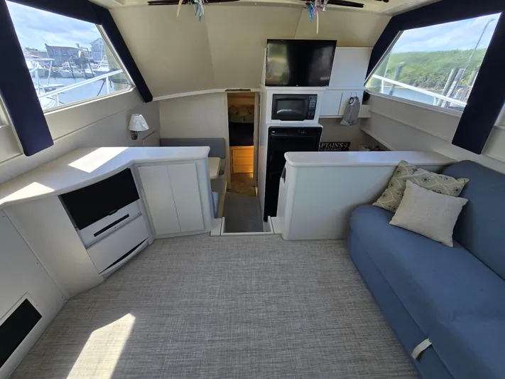  Yacht Photos Pics Interior of 1998 Henriques 38 Sportfisherman with modern amenities and comfortable seating.
