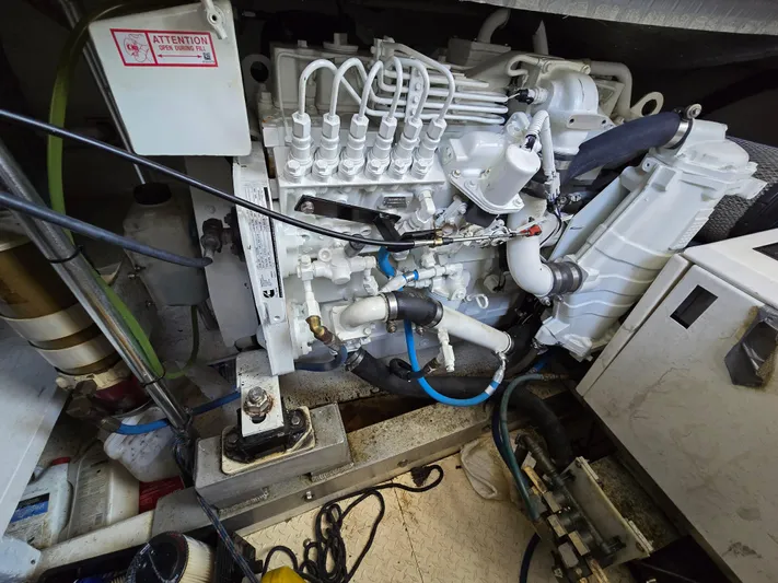  Yacht Photos Pics Engine room of a 1998 Henriques 38 Sportfisherman, showcasing detailed mechanical components.