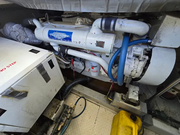 Yacht Photos Pics Engine room of a 1998 Henriques 38 Sportfisherman with Diamond Performance Series engine.