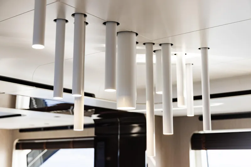 Chillin' Yacht Photos Pics Modern ceiling lights in the 2020 Azimut Grande 27 METRI yacht interior.