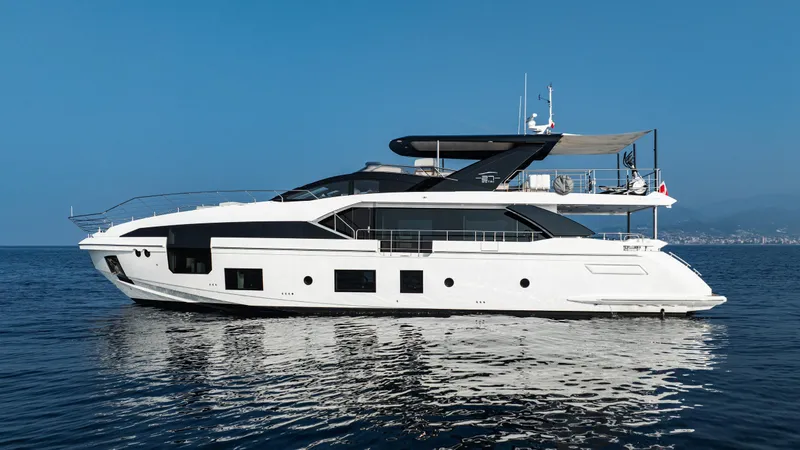 Chillin' Yacht Photos Pics Luxurious 2020 Azimut Grande 27 METRI yacht on calm blue waters.