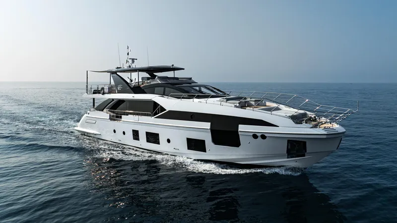 Chillin' Yacht Photos Pics Luxury Azimut Grande 27 METRI yacht cruising on open sea, 2020 model.