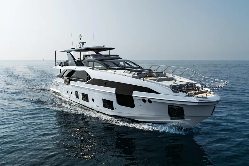 Chillin' Yacht Photos Pics Luxury Azimut Grande 27 METRI yacht cruising on open sea, 2020 model.