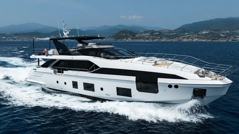 Chillin' Yacht Photos Pics Luxury Azimut Grande 27 METRI yacht cruising on open sea, 2020 model.