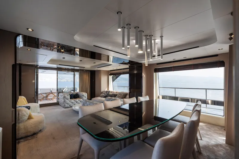 Chillin' Yacht Photos Pics Luxurious interior of 2020 Azimut Grande 27 METRI yacht with elegant dining area.
