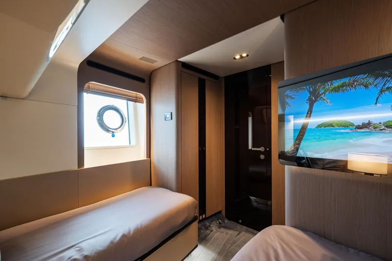 Chillin' Yacht Photos Pics Luxurious cabin interior of 2020 Azimut Grande 27 METRI yacht with modern decor.