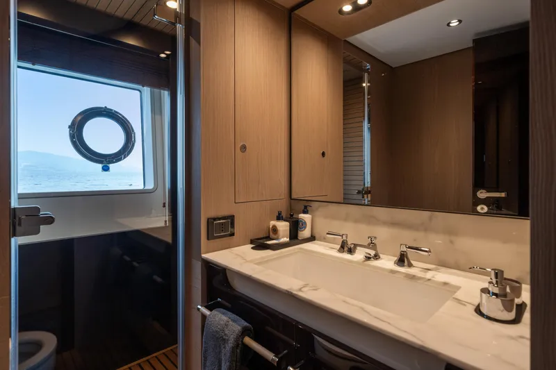 Chillin' Yacht Photos Pics Luxurious bathroom in 2020 Azimut Grande 27 METRI yacht with ocean view.
