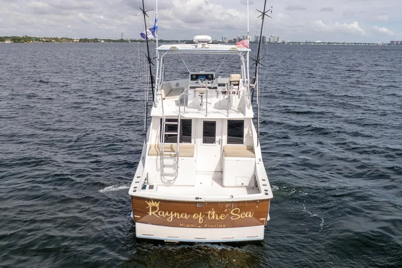  Yacht Photos Pics 1978 Hatteras 42 Convertible boat on water, named "Rayna of the Sea," Miami, Florida.