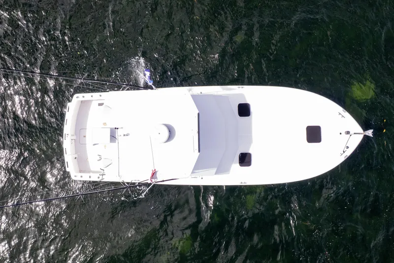  Yacht Photos Pics Aerial view of 1978 Hatteras 42 Convertible boat on water.