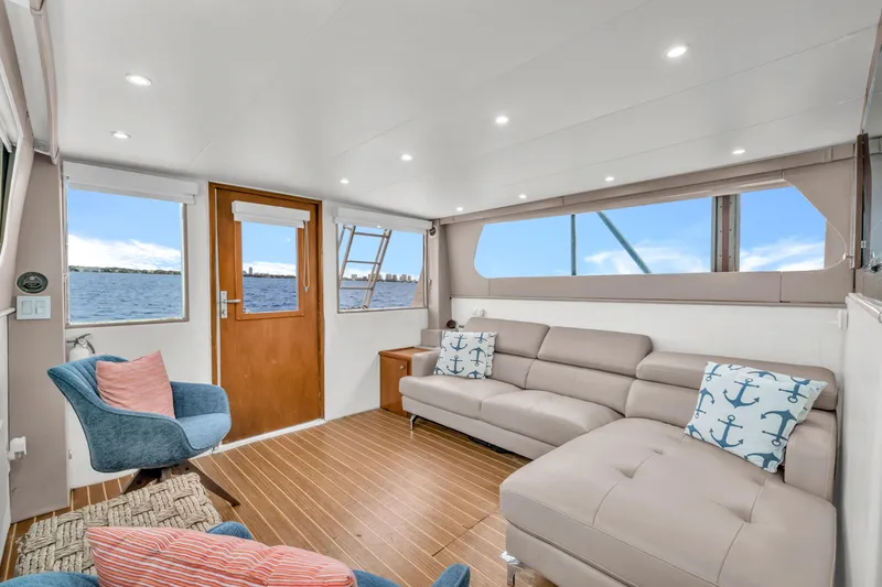  Yacht Photos Pics Interior of 1978 Hatteras 42 Convertible yacht with modern seating and ocean view.