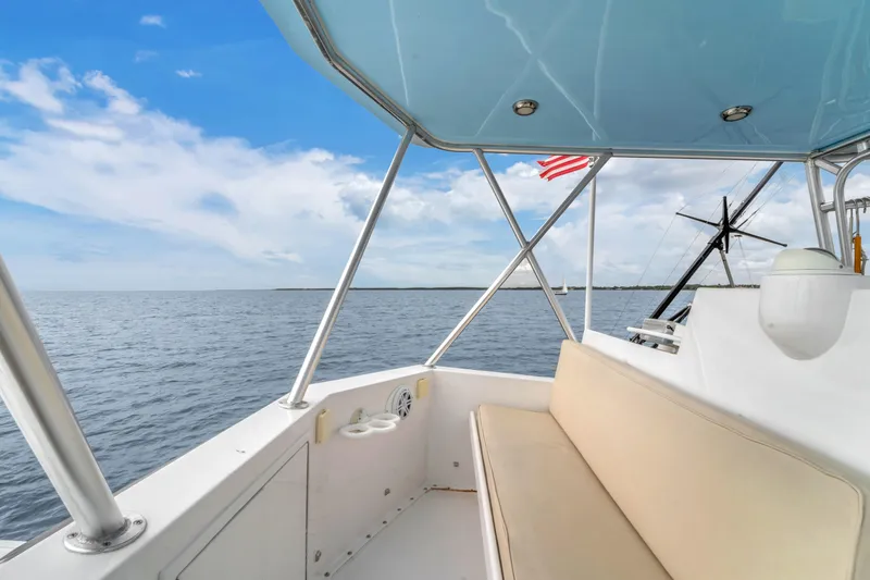  Yacht Photos Pics 1978 Hatteras 42 Convertible boat interior with ocean view and American flag.
