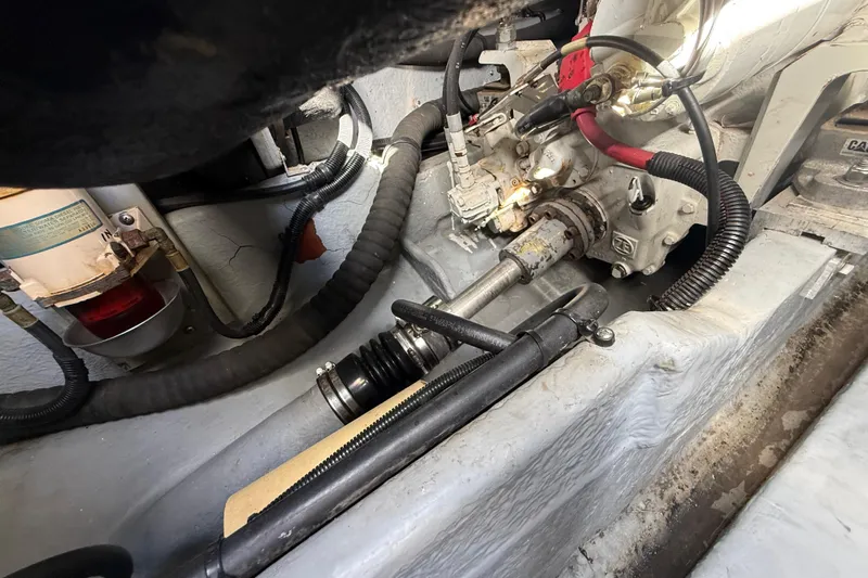  Yacht Photos Pics Engine compartment of a 1999 Sea Ray 410 Express Cruiser, showing mechanical components and wiring.