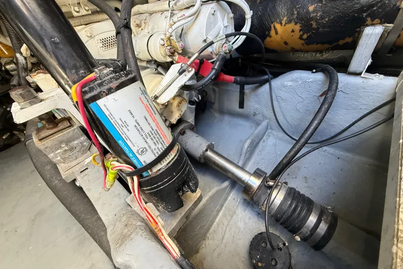  Yacht Photos Pics Engine compartment of a 1999 Sea Ray 410 Express Cruiser, showing mechanical components and wiring.