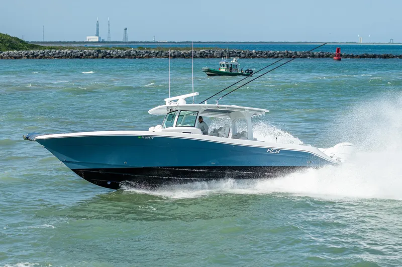 Tingum Yacht Photos Pics 2021 HCB 42 Lujo boat cruising on the water.