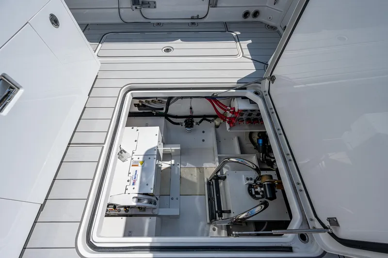 Tingum Yacht Photos Pics 2021 HCB 42 Lujo boat engine compartment with open hatch.