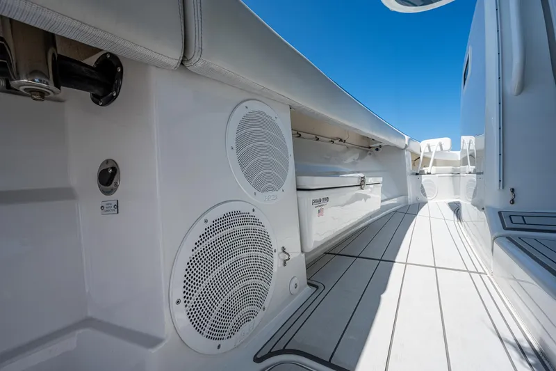 Tingum Yacht Photos Pics 2021 HCB 42 Lujo boat interior with speakers and storage compartments.
