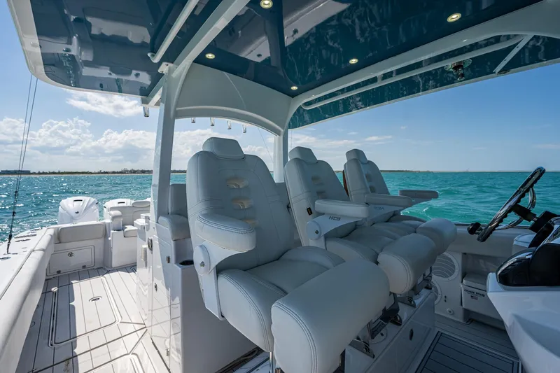 Tingum Yacht Photos Pics 2021 HCB 42 Lujo boat interior with luxurious seating and ocean view.