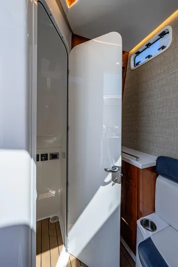 Tingum Yacht Photos Pics 2021 HCB 42 Lujo boat interior with open door and seating area.