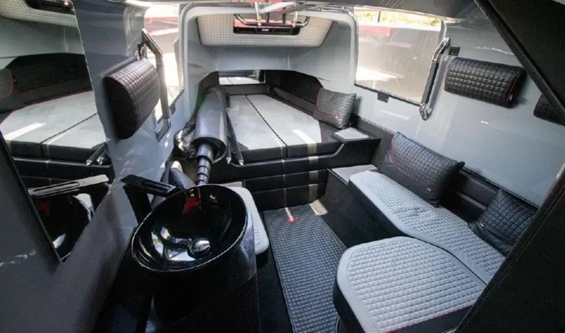  Yacht Photos Pics Interior of 2021 BRABUS Brabus Shadow 900 BO luxury boat cabin with seating and sink.