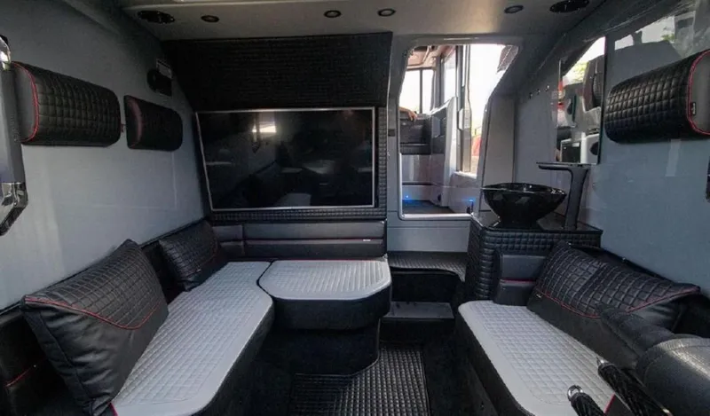  Yacht Photos Pics Luxurious interior of 2021 BRABUS Brabus Shadow 900 BO with modern seating and entertainment system.