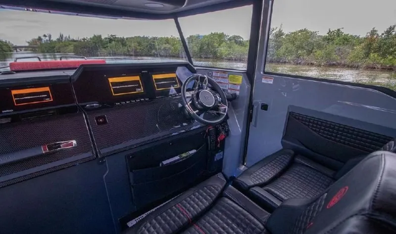  Yacht Photos Pics Interior of 2021 BRABUS Brabus Shadow 900 BO luxury boat with modern dashboard and leather seats.