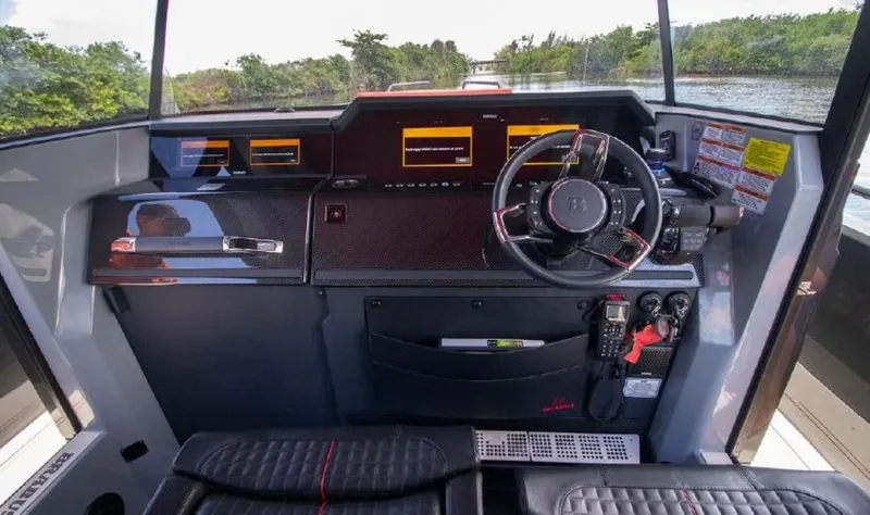  Yacht Photos Pics 2021 BRABUS Shadow 900 BO boat cockpit with advanced navigation system and luxurious interior.