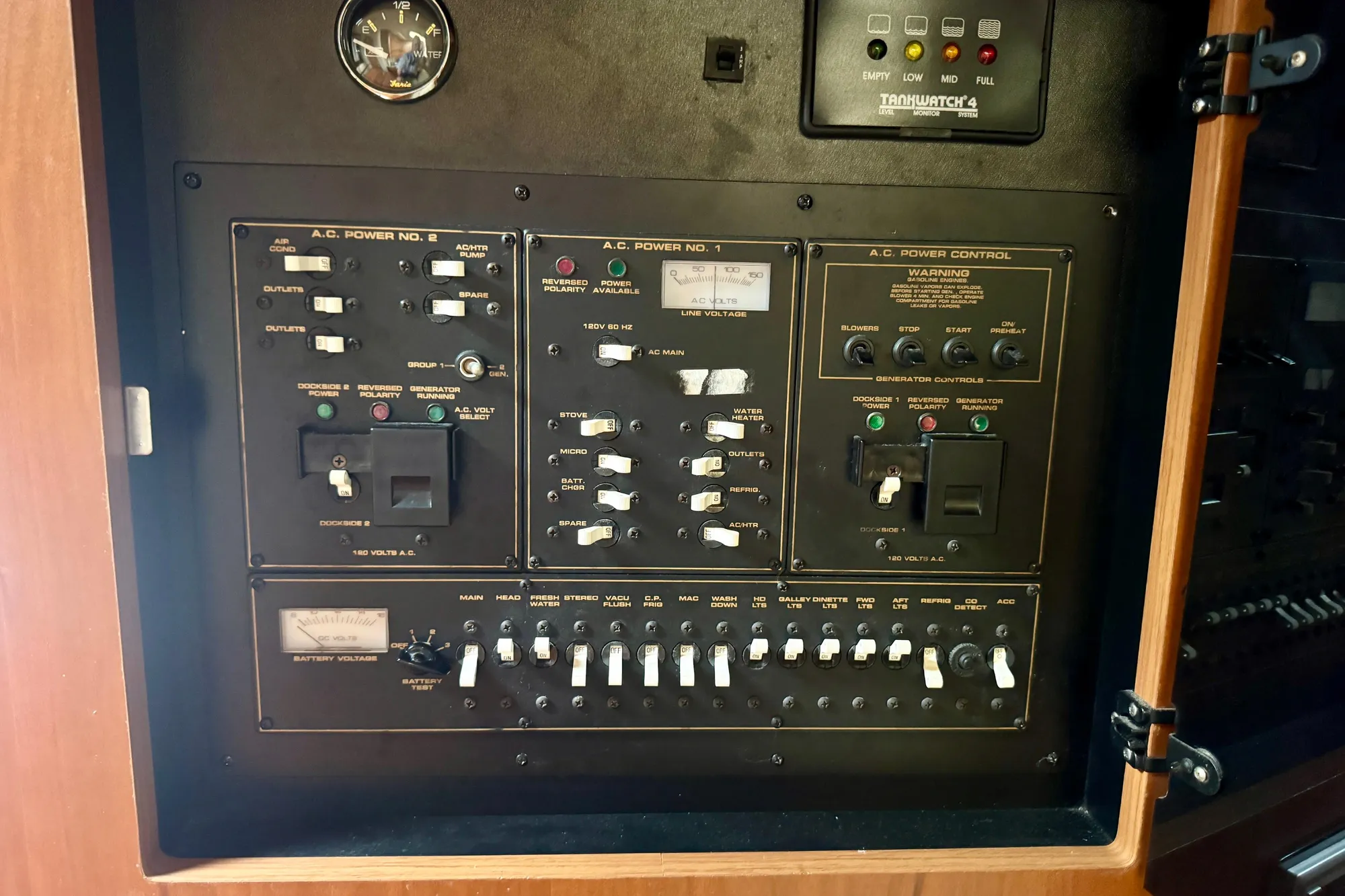 Electrical control panel on a 2001 Cruisers Yachts 3470 Express boat.