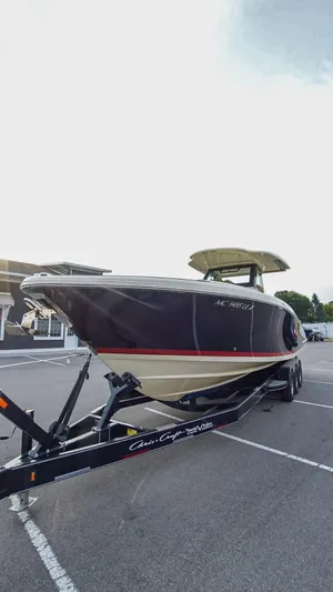  Yacht Photos Pics 2020 Chris-Craft 30 Catalina boat on trailer in parking lot.