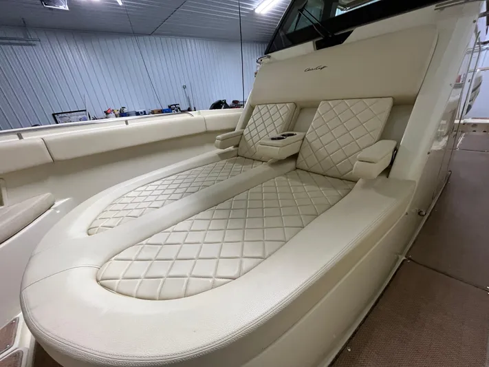  Yacht Photos Pics Luxurious interior of 2020 Chris-Craft 30 Catalina boat with quilted leather seating.