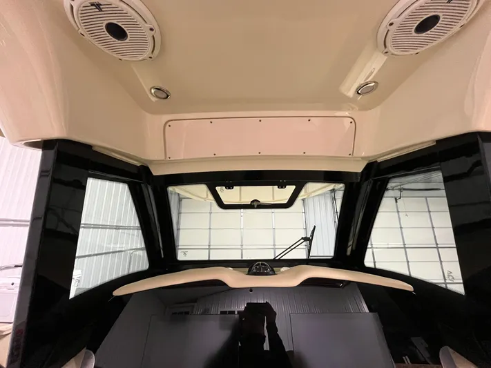  Yacht Photos Pics Interior view of 2020 Chris-Craft 30 Catalina boat, featuring speakers and dashboard.