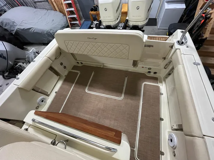  Yacht Photos Pics 2020 Chris-Craft 30 Catalina boat interior with dual engines and cushioned seating.