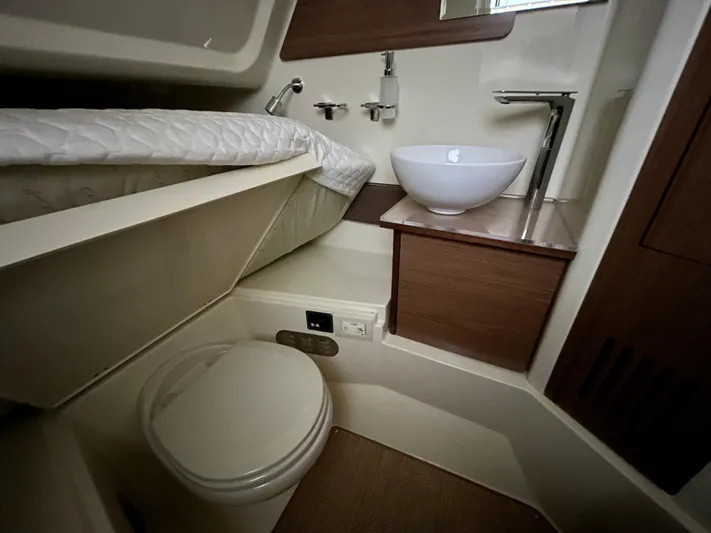  Yacht Photos Pics 2020 Chris-Craft 30 Catalina bathroom with modern sink and toilet.