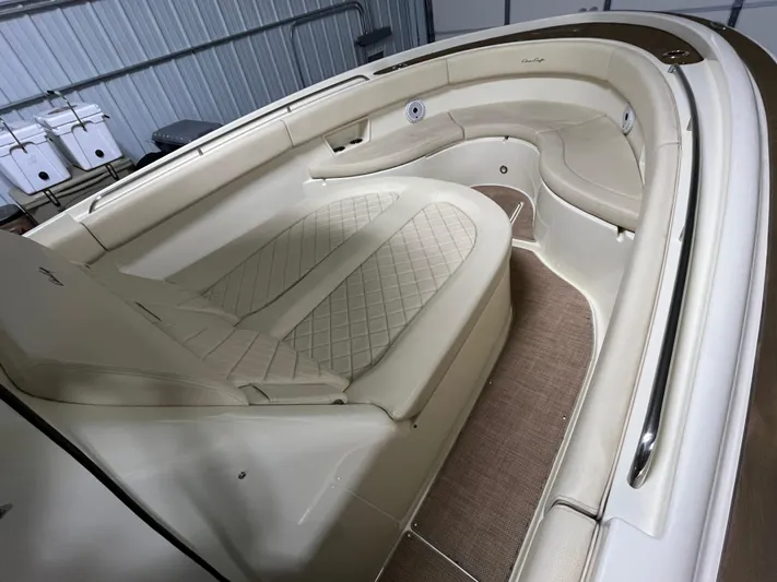  Yacht Photos Pics 2020 Chris-Craft 30 Catalina boat interior with beige seating and elegant design.