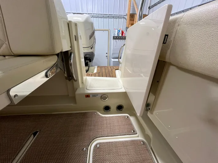  Yacht Photos Pics 2020 Chris-Craft 30 Catalina interior detail with seating and storage compartments.