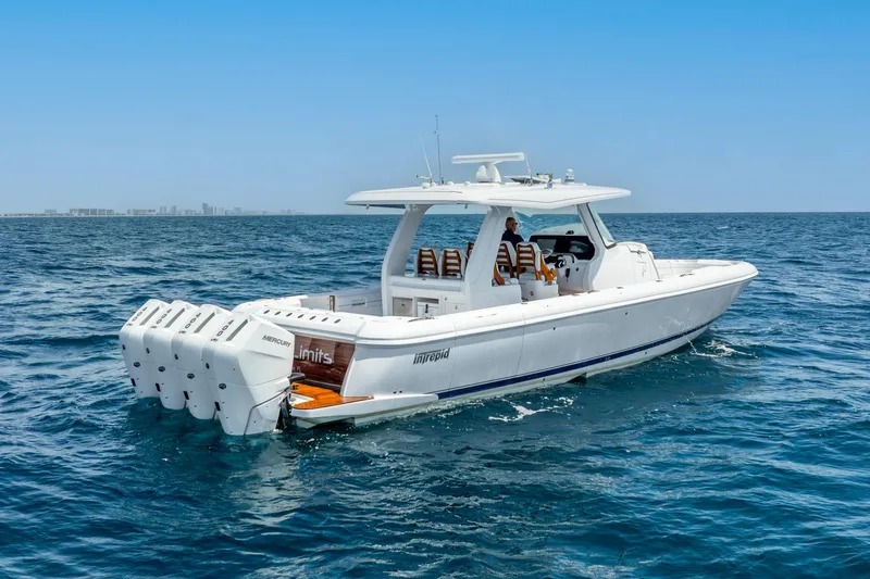  Yacht Photos Pics 2024 Intrepid 427 Nomad SE boat cruising on open water.