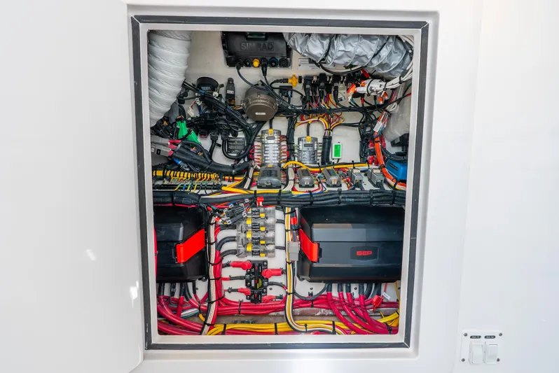 Yacht Photos Pics Electrical system of 2024 Intrepid 427 Nomad SE boat, showcasing wiring and components.