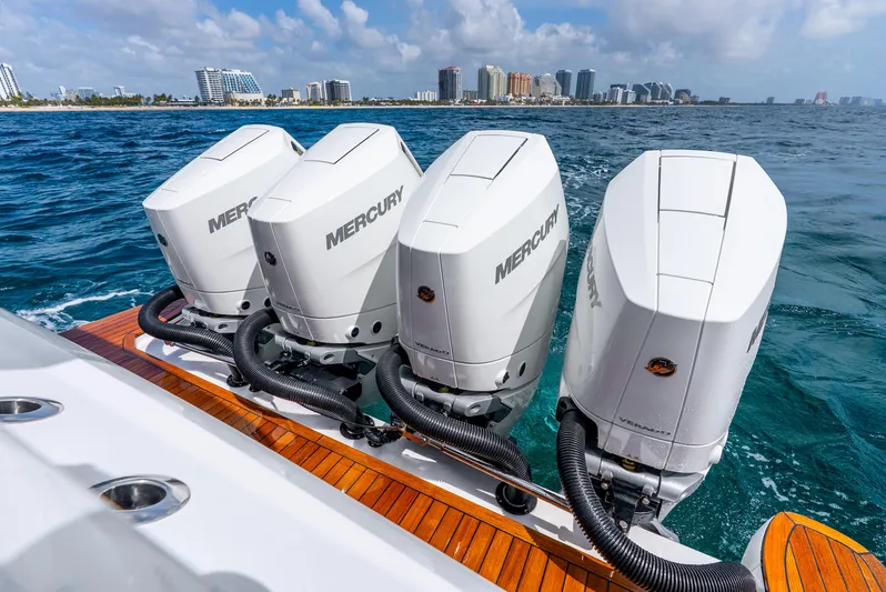  Yacht Photos Pics Four Mercury outboard engines on a 2024 Intrepid 427 Nomad SE boat, ocean backdrop.