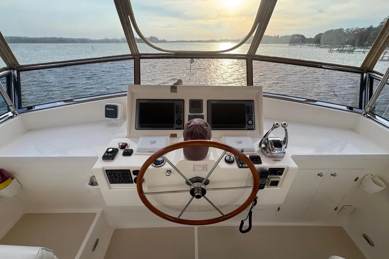 Adagio Yacht Photos Pics Helm of 2011 Grand Banks 47 Heritage EU yacht with scenic water view.