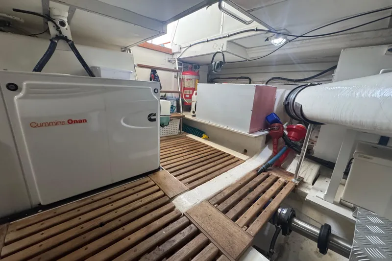 Adagio Yacht Photos Pics Engine room of 2011 Grand Banks 47 Heritage EU with Cummins Onan generator.