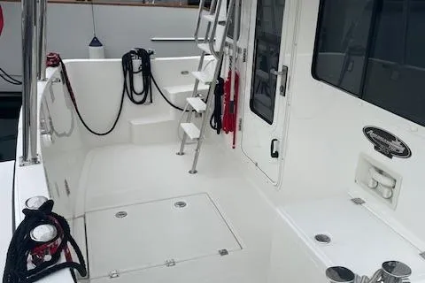  Yacht Photos Pics 2018 American Tug 365 boat deck with ladder and ropes.