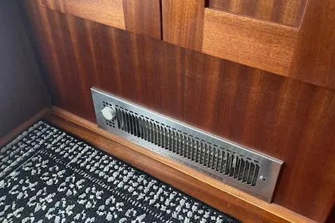  Yacht Photos Pics Vent on wooden paneling in 2018 American Tug 365 boat interior.