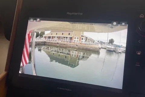  Yacht Photos Pics Raymarine display on 2018 American Tug 365 showing marina view with docked boats.