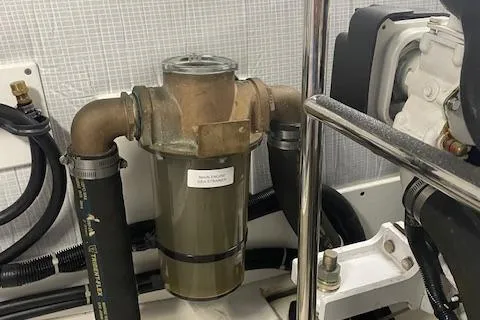  Yacht Photos Pics Engine room of 2018 American Tug 365 with visible filter and hoses.