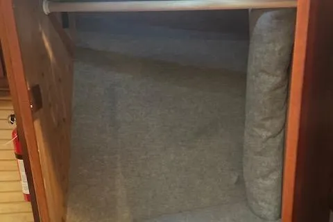  Yacht Photos Pics Interior cabin space of a 2018 American Tug 365 boat, featuring carpeted flooring.