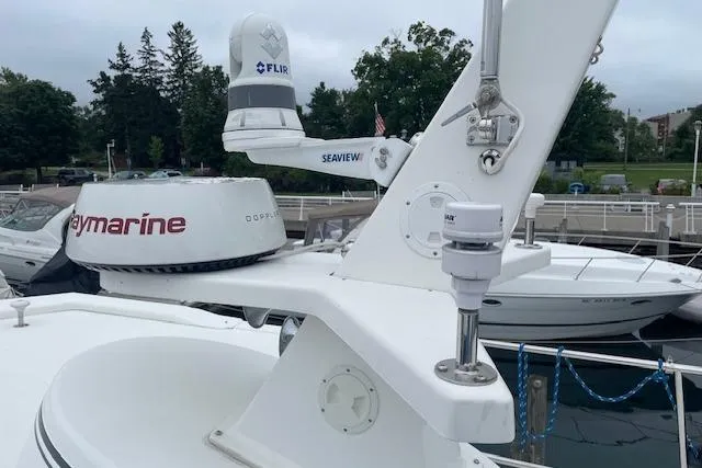  Yacht Photos Pics American Tug 365 (2018) with Raymarine and FLIR equipment at a marina.