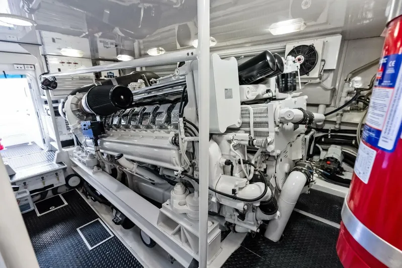 Cap'n Hook Yacht Photos Pics Engine room of 2006 Viking 68 Enclosed Bridge yacht, showcasing powerful machinery and equipment.