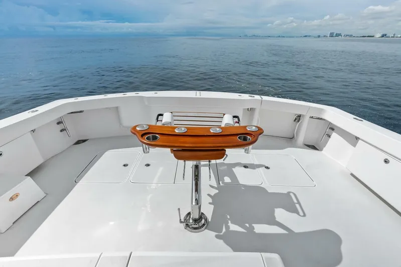 Cap'n Hook Yacht Photos Pics 2006 Viking 68 Enclosed Bridge yacht deck with ocean view and fishing chair.