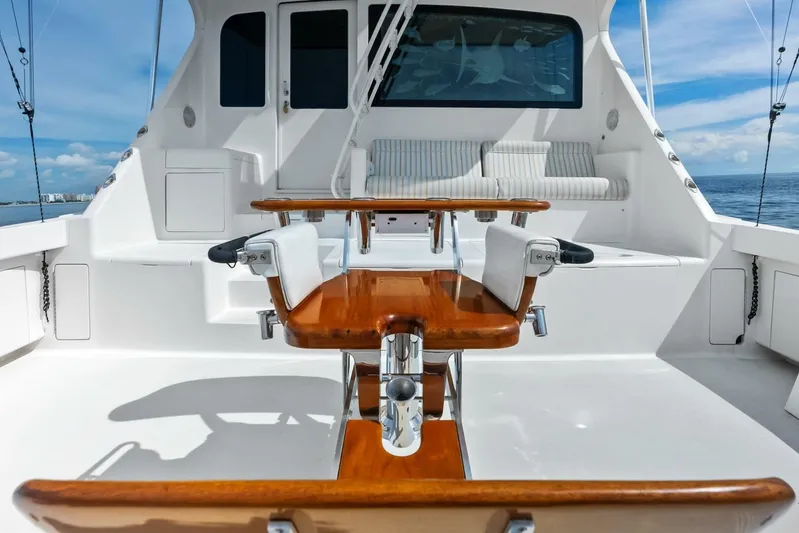 Cap'n Hook Yacht Photos Pics 2006 Viking 68 Enclosed Bridge yacht with spacious deck and seating area.