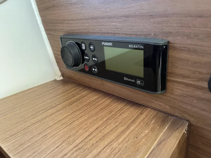  Yacht Photos Pics Fusion MS-RA70N stereo system on 2019 Jeanneau Leader 9.0 WA boat interior.