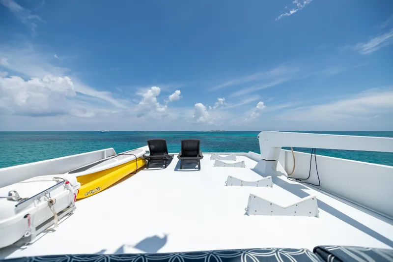 Island Time Yacht Photos Pics Top deck of a 1991 Broward Motor Yacht with ocean view.